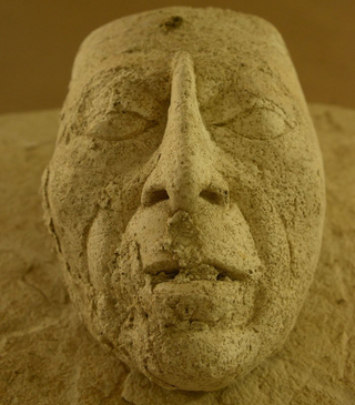 Illustration for article titled Esta máscara podría ser el rostro del rey maya cuyo mandato fue el más largo en la historia